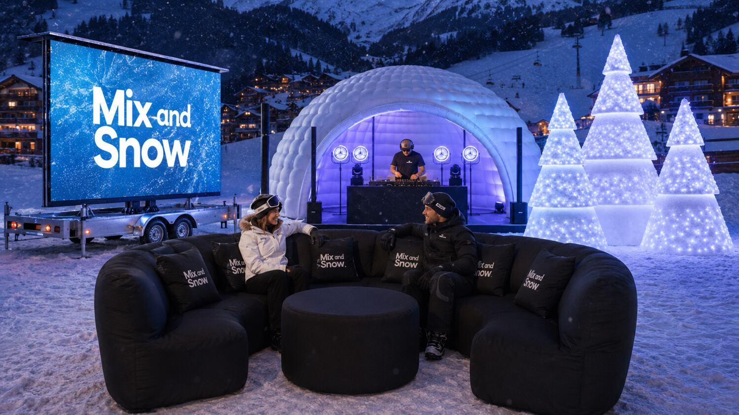 Salon FATPOP noir devant l’igloo et l’écran LED Mix et Snow